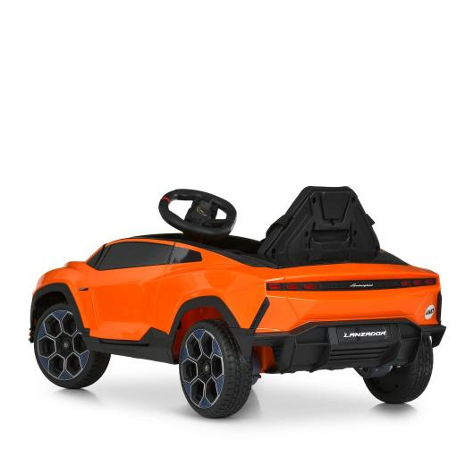 Вид сзади на корпус и спойлер детского электромобиля Lamborghini