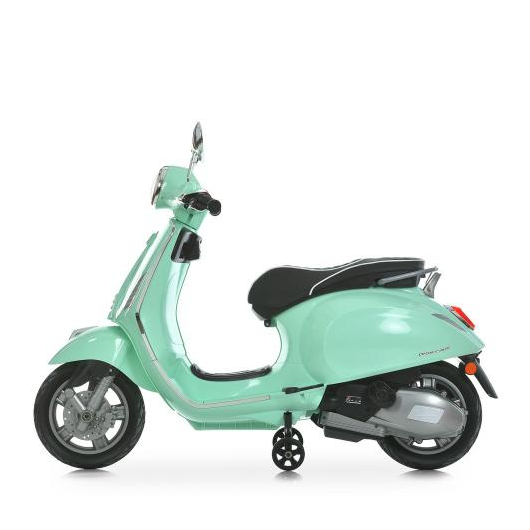 М'ятний електроскутер для дітей Vespa, вигляд збоку (профіль)