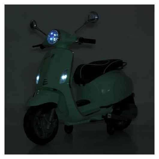 М'ятний дитячий скутер Vespa M 6288EL-15 з увімкненими фарами у темряві